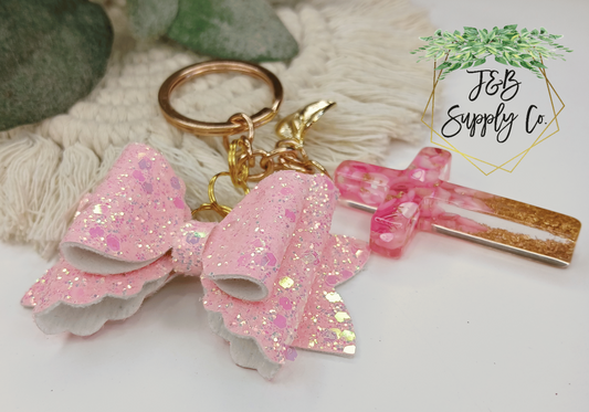 10pc Handmade resin cross glitter bow keychain