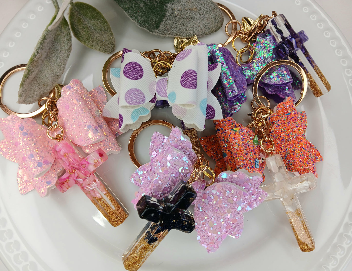 10pc Handmade resin cross glitter bow keychain